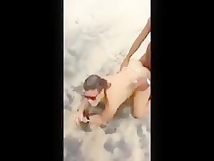 They Take Turns Taking Dick On The Beach